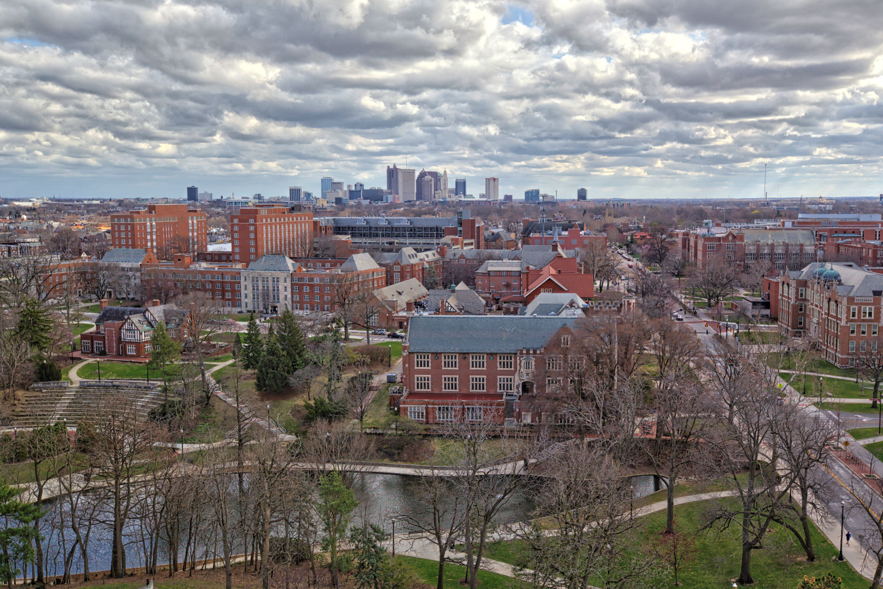 Photograph of the Ohio State campus with the Columbus skyline in the background