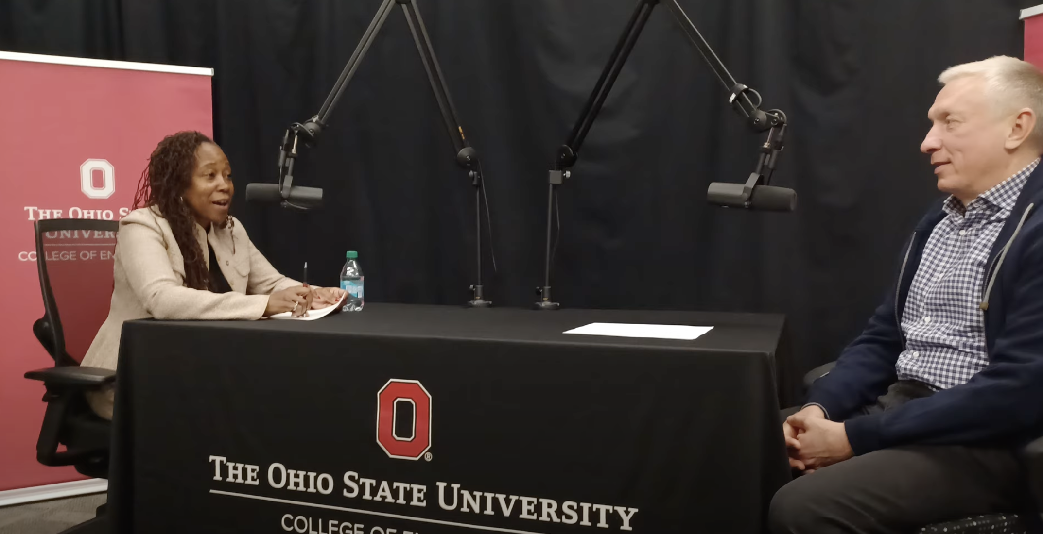 Dean ayanna howard and ratmir timeshev at a table