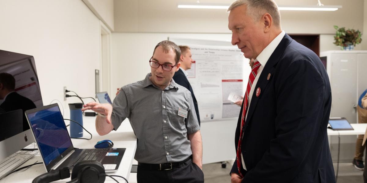 Ratmir Timashev speaks to a student at ohio state