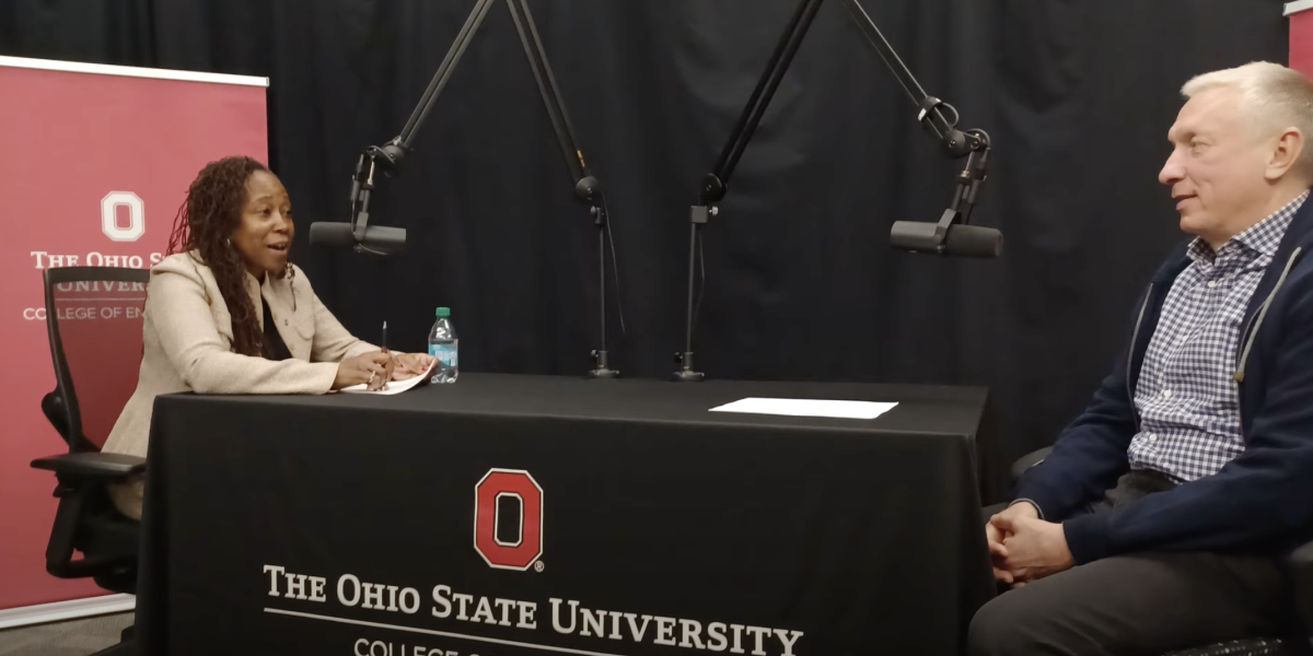 Dean ayanna howard and ratmir timeshev at a table